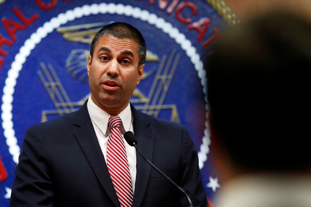 (Jacquelyn Martin | The Associated Press) After a meeting voting to end net neutrality, Federal Communications Commission (FCC) Chairman Ajit Pai answers a question from a reporter, Thursday, Dec. 14, 2017, in Washington.