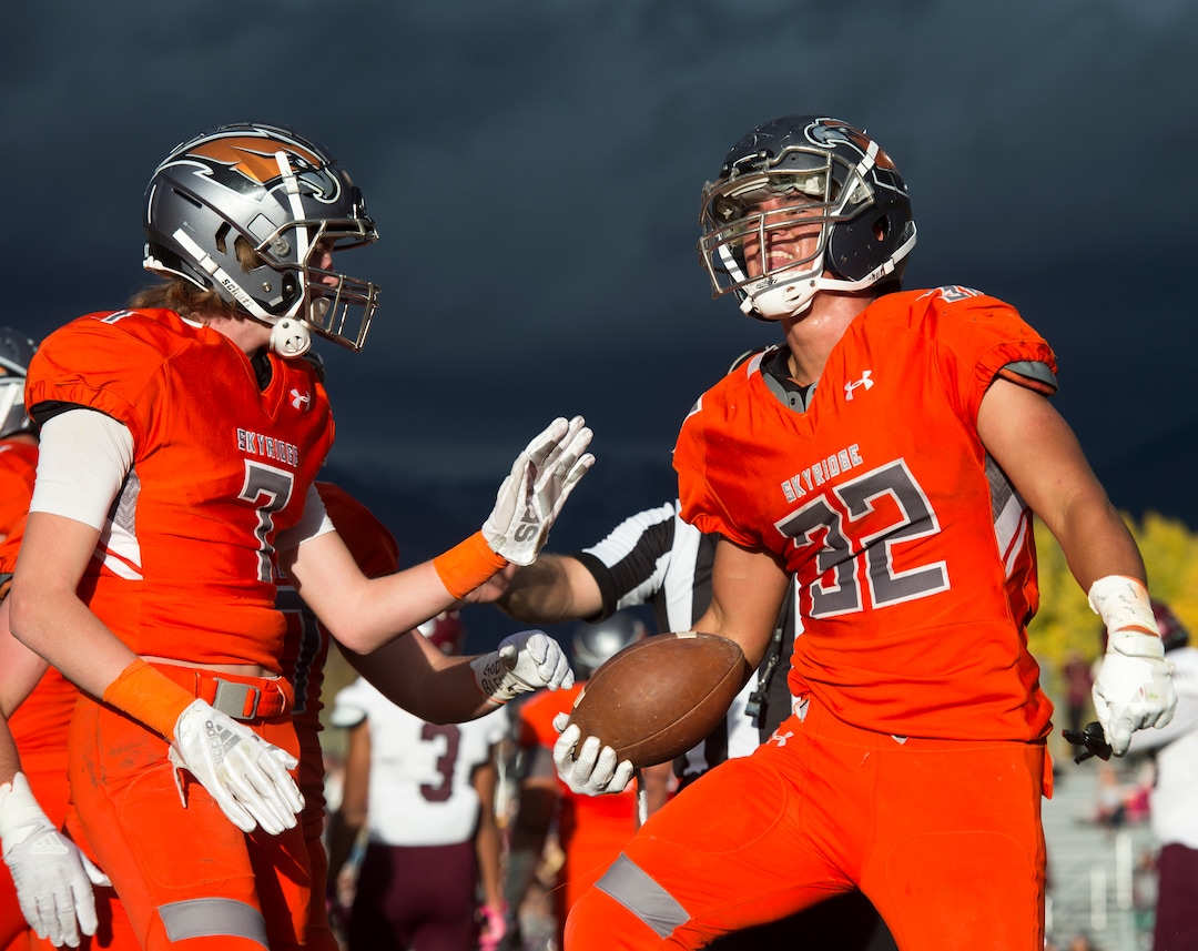 (Rick Egan  |  The Salt Lake Tribune)   Skyridge running back Ma'a Notoa (32) celebrates after scoring a touchdownin prep 5A playoff action between Jordan High and Skyridge High, in Lehi, Friday, Nov. 2, 2018.