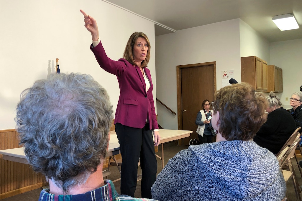 (Alexandra Jaffe | AP) In this Saturday, Dec. 21, 2019, photo, Rep. Cindy Axne, D-Iowa, speaks to constituents about her vote on the USMCA trade deal in Guthrie Center, Iowa. Axne, who represents a district Donald Trump won in 2016, has been targeted by Republicans for her support of the impeachment proceedings, but at the town hall none of her constituents raised her vote against the president.