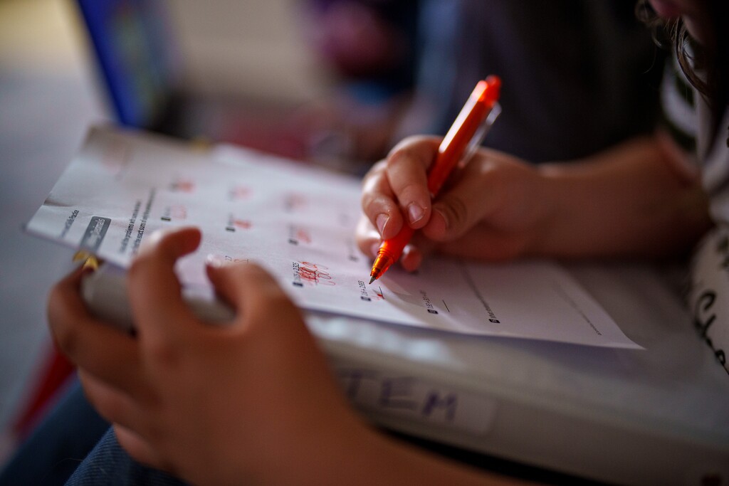 (Trent Nelson  |  The Salt Lake Tribune) A Utah child works on a homeschool assignment in her Springville home on Thursday, May 9, 2024.