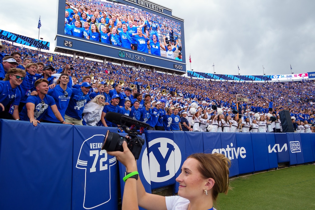 (Trent Nelson | The Salt Lake Tribune) Madi Allphin films fans as BYU hosts Southern Utah University, NCAA football in Provo on Saturday, Sept. 9, 2023.