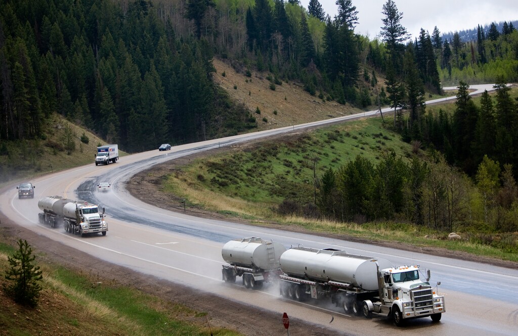 Kim Raff | The Salt Lake Tribune
Oil tankers use U.S. Highway 40 near Daniels Summit to travel from the oil fields in the Uinta Basin to Salt Lake refineries on May 18, 2012. A controversial railroad that would connect the basin's production with the national rail network has won federal approvals.