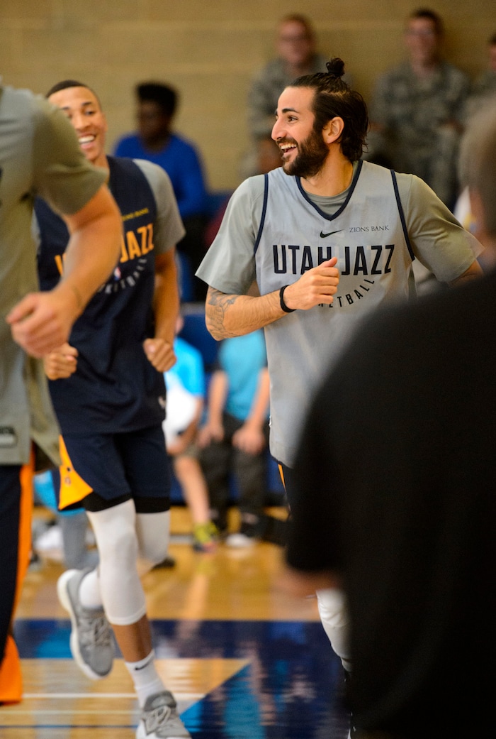 (Steve Griffin  |  The Salt Lake Tribune)    Utah Jazz guard Dante Exum (11), left, and new Jazz guard Ricky Rubio and the rest to the Jazz warm-up in the Warrior Fitness Center on Hill Air Force Base as they prepare to scrimmage as a part of a "Hoops for Troops" promotion Ogden Friday September 29, 2017. It's also Utah's first public scrimmage of the season, and the first look at how the new pieces of the team will work together. 