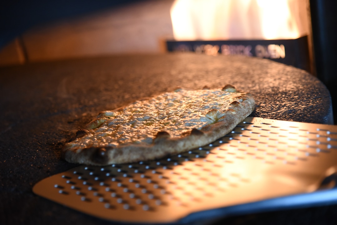 (Francisco Kjolseth  |  The Salt Lake Tribune)  An order of cheese bread sticks comes out of the oven at Wicked Peel Pizza Kitchen in Riverton.