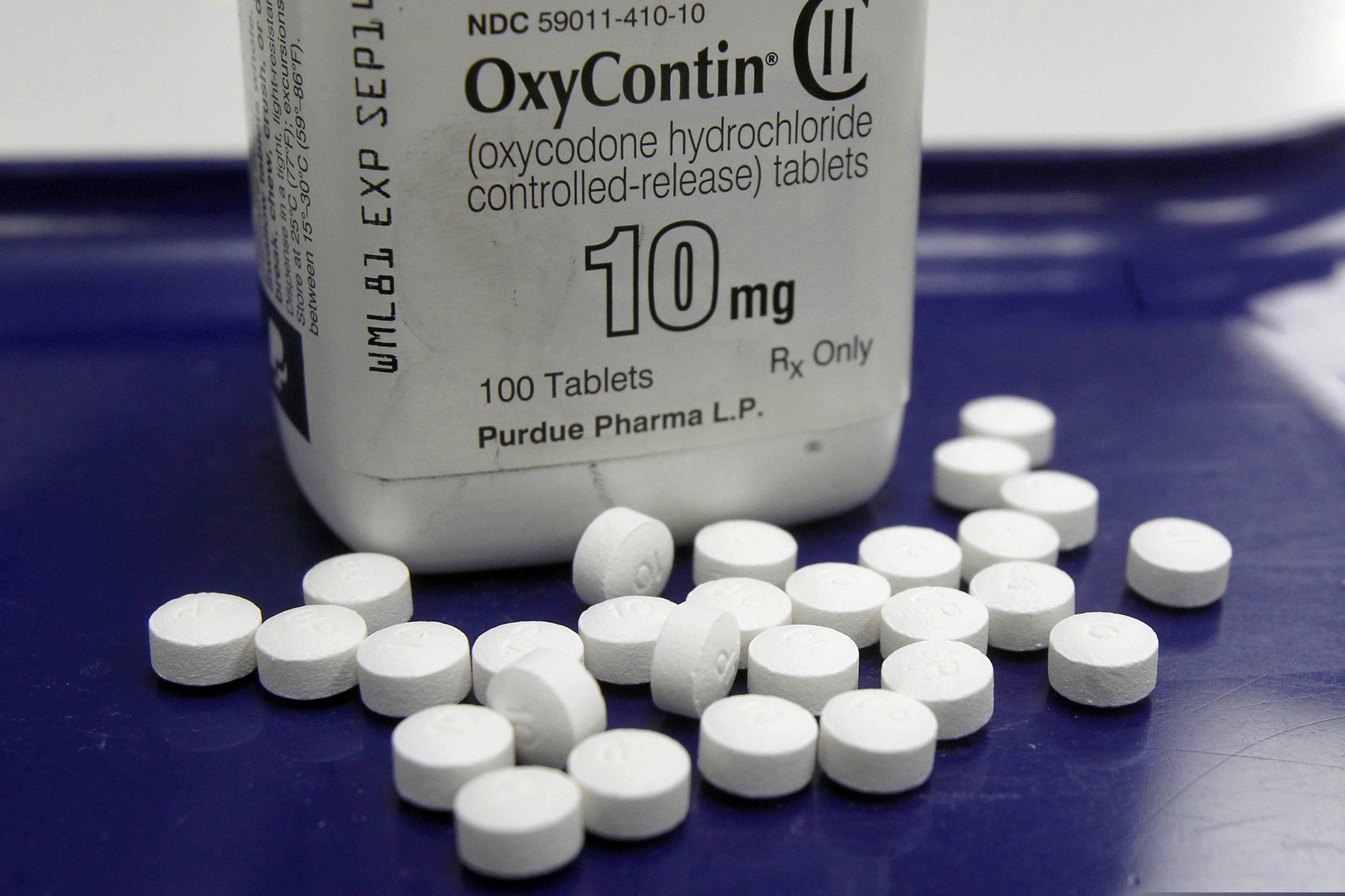 (Toby Talbot | Associated Press file photo)  OxyContin pills are arranged for a photo at a pharmacy in Montpelier, Vt., on Feb. 19, 2013.