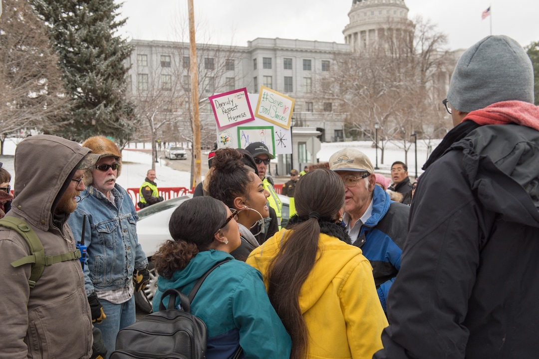 (Rachel Molenda  |  The Salt Lake Tribune)  Protesters and a Trump supporter scream at one another  outside the capitol building in Salt Lake City, Utah, on Monday, December 4, 2017.