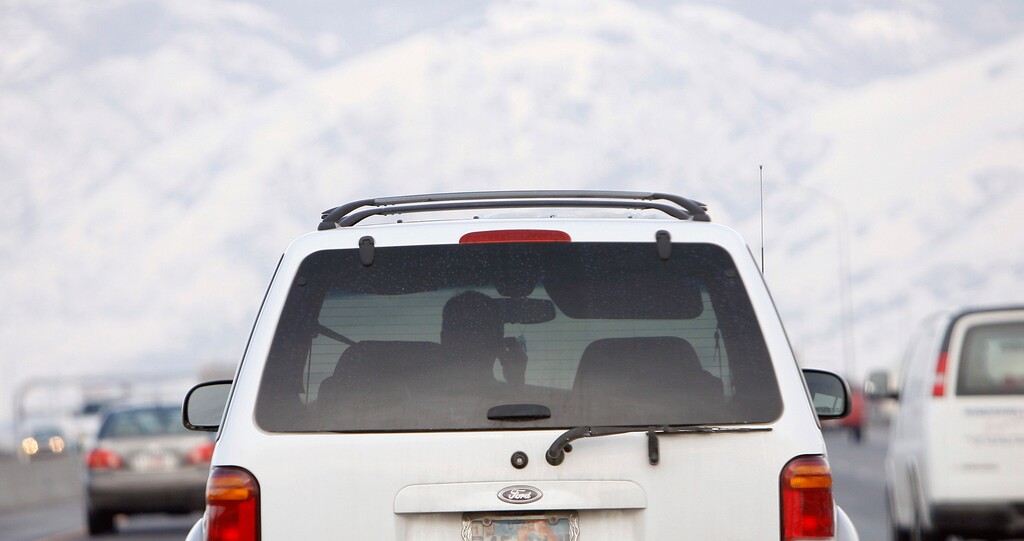 (Chris Detrick  |  Tribune File Photo)  A driver talks on his cell phone while driving northbound on Interstate 15 on January 2, 2008.