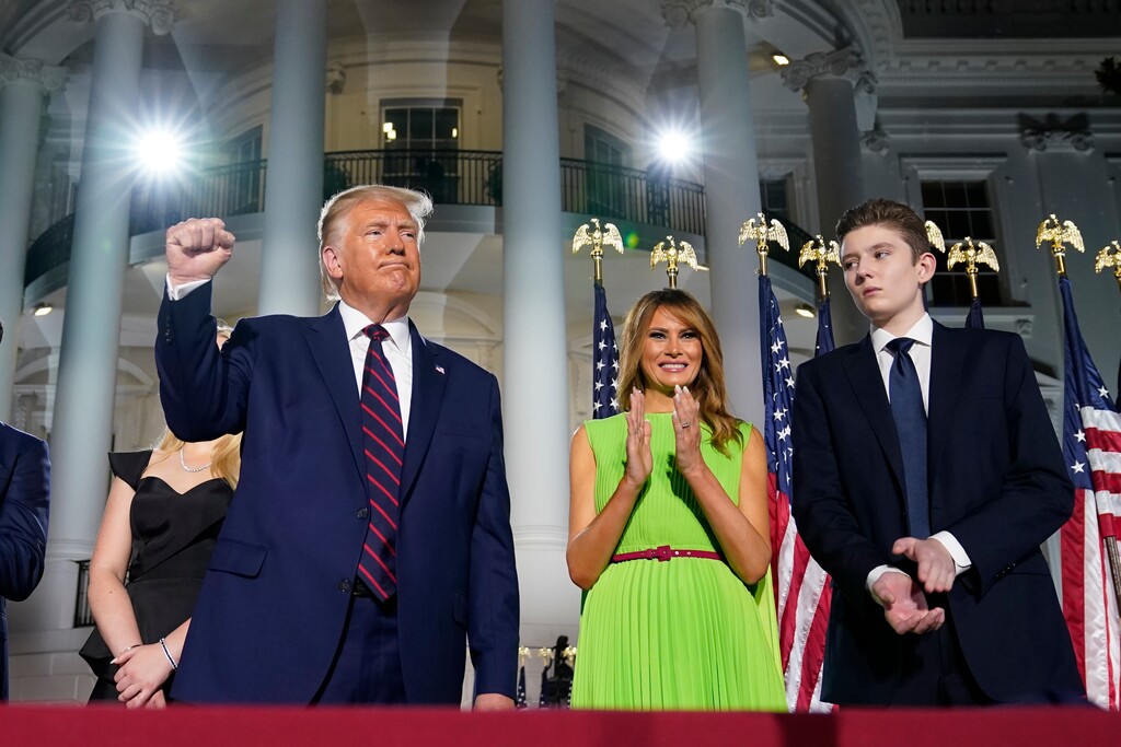 (Evan Vucci | AP photo)

President Donald Trump, first lady Melania Trump and Barron Trump stand on the South Lawn of the White House on the fourth day of the Republican National Convention, Aug. 27, in Washington.