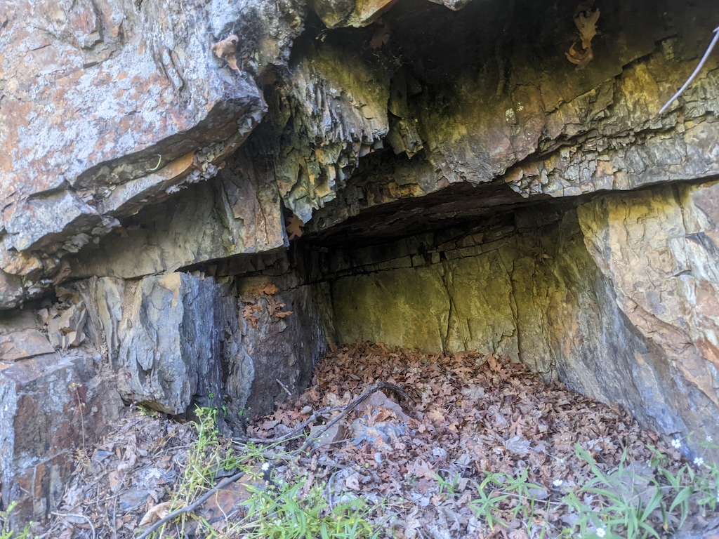 (Julie Jag | The Salt Lake Tribune) Miners cut this notch, seen on July 7, 2022, into a cliffside along the Mule Hollow Mine trail. The 3-mile round-trip trail climbs through a shady creek bed in Big Cottonwood Canyon. Several mines can also be found at the top, if you know where to look.