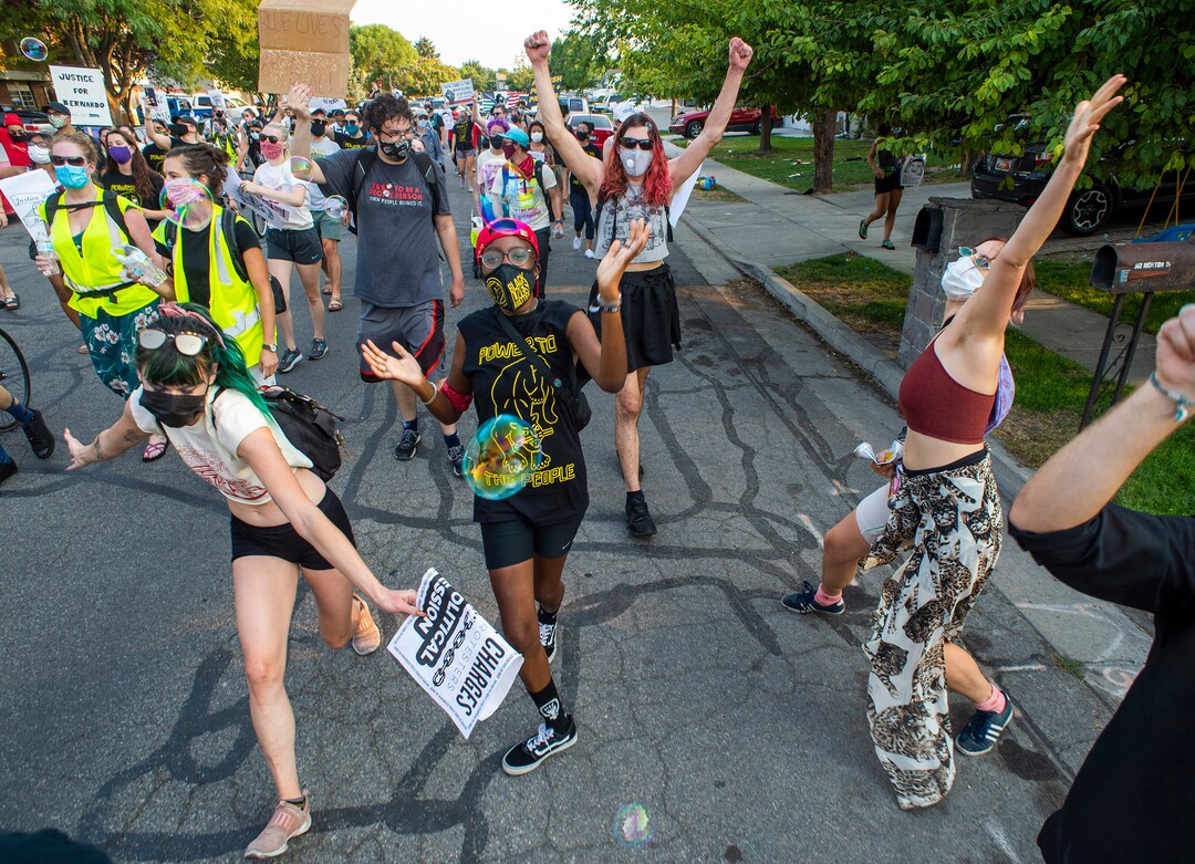 (Rick Egan  |  The Salt Lake Tribune)     Protesters dance to “We are the World”  during the Dance Dance for Revolution protest in Rose Park on Sunday, Aug. 23, 2020. The protest was in memory of Jovany Mercardo who was shot last August by Ogden police by four officers, hitting his body sixteen times.