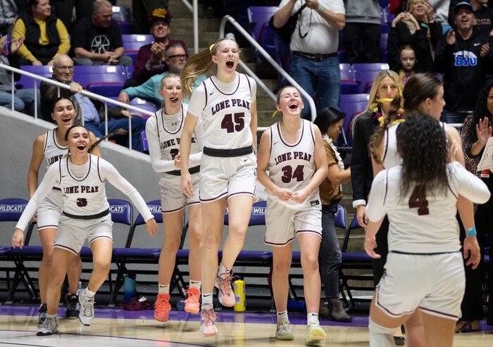 (Rick Egan | The Salt Lake Tribune) Lone Peak celebrates their win over the Skyridge Falcons, in the 6A girls Championship Game between Skyridge and Lone Peak, at Weber State, on Saturday, March 4, 2023.

