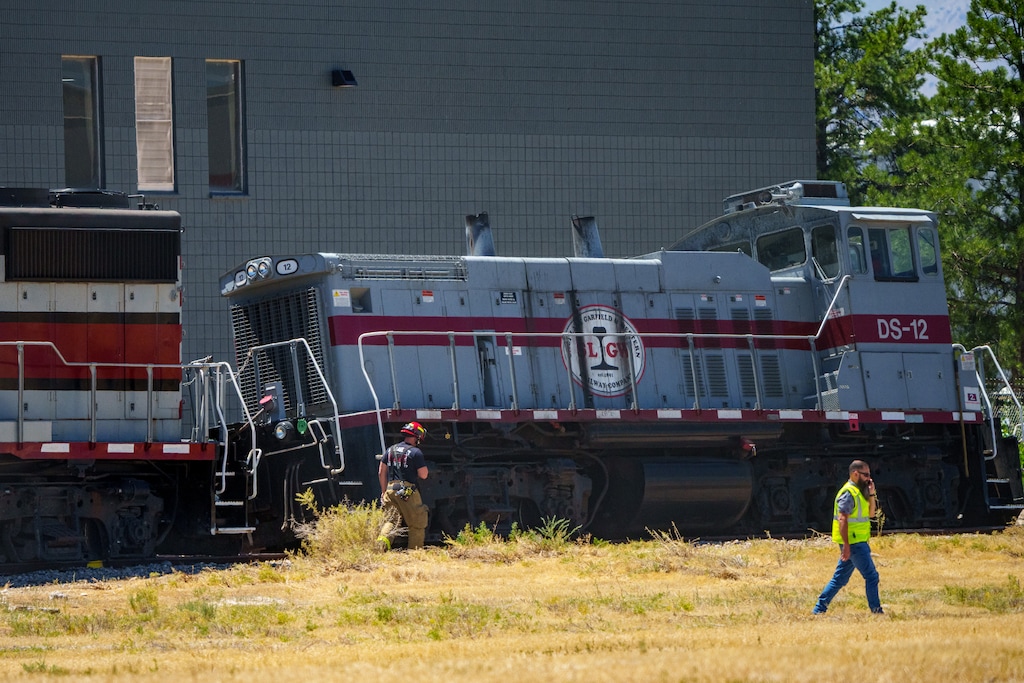 (Trent Nelson | The Salt Lake Tribune) Firefighters at an active hazmat situation involving a train that has leaked diesel west of the Salt Lake City International Airport on Friday, July 11, 2025.