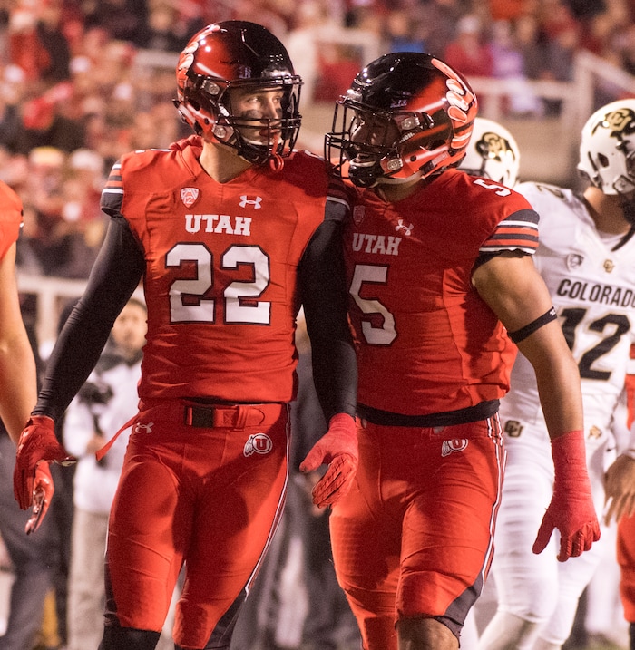 (Rick Egan  |  The Salt Lake Tribune) Utah Utes defensive back Chase Hansen (22) is congratulated by Utah Utes linebacker Kavika Luafatasaga (5) after Hanson sacked Colorado Buffaloes quarterback Steven Montez (12), in PAC-12 football action Utah Utes vs. Colorado Buffaloes at Rice-Eccles stadium, Saturday, November 25, 2017.