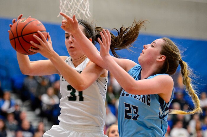 (Trent Nelson | The Salt Lake Tribune)  Hillcrest's Annabella Jensen (31) grabs the ball ahead of Westlake's Tatum Peterson (23) as Hillcrest faces Westlake in the 6A High School Girls' Basketball Tournament at SLCC in Taylorsville, Thursday Feb. 22, 2018.