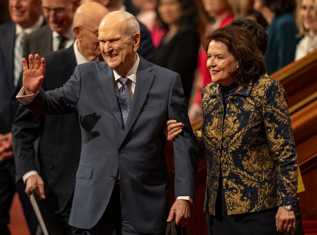 (Rick Egan | The Salt Lake Tribune) President Russell M. Nelson, with wife Wendy, waves to the audience at a General Conference in 2022. He died Sept. 27 at age 101.