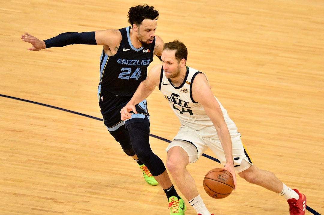 Utah Jazz forward Bojan Bogdanovic (44) handles the ball against Memphis Grizzlies forward Dillon Brooks (24) in the second half of Game 4 of an NBA basketball first-round playoff series Monday, May 31, 2021, in Memphis, Tenn. (AP Photo/Brandon Dill)