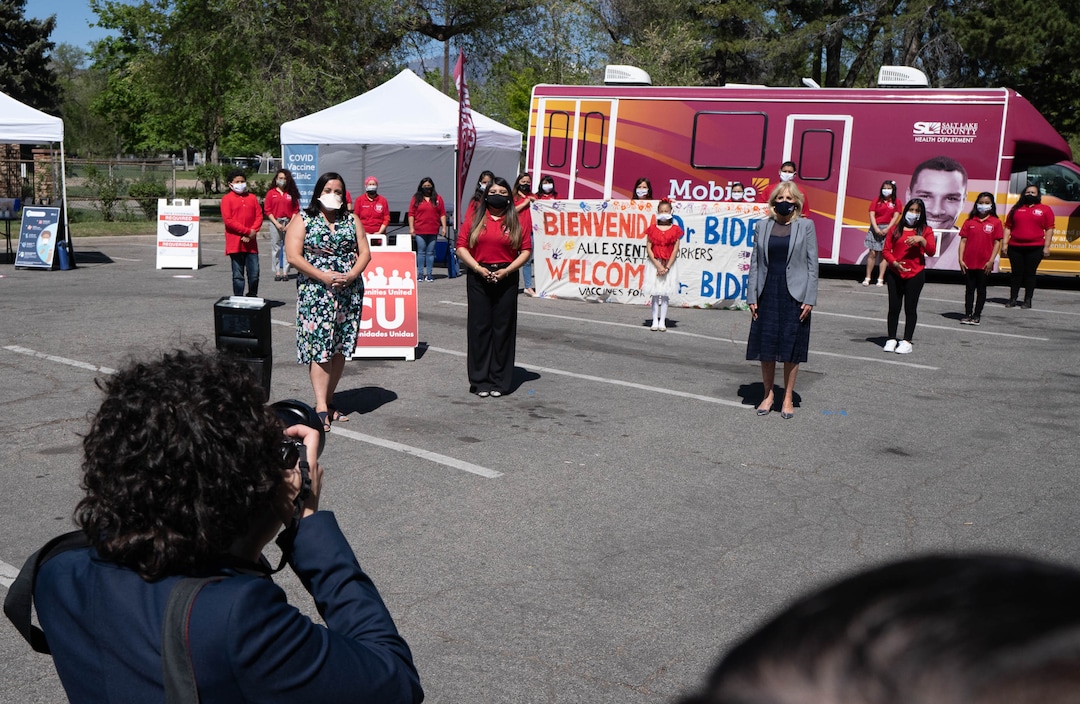 (Francisco Kjolseth | The Salt Lake Tribune) First lady Jill Biden, right, poses for a socially distanced photograph with Rep. Angela Romero, D-Salt Lake, left, and members of the nonprofit organization Comunidades Unidas as she visits a pop-up COVID-19 vaccine clinic in Jordan Park on Salt Lake City’s west side on Wednesday, May 5, 2021.