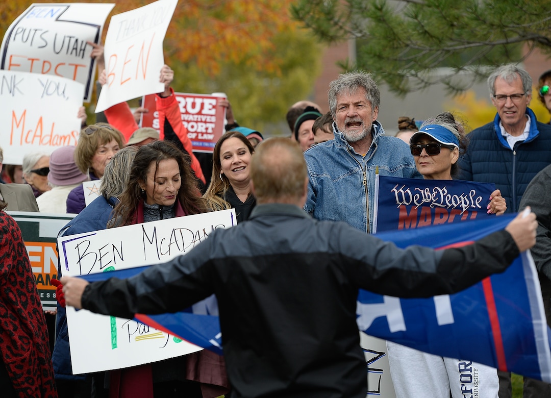 (Francisco Kjolseth | The Salt Lake Tribune) Kevin Howard, foreground, argues with supporters of the impeachment inquiry as two competing rallies spar near Rep. Ben McAdams' office in West Jordan, one seeking to support McAdams and one to criticize him for supporting the impeachment inquiry of President Donald Trump on Wednesday, Oct. 9, 2019.
