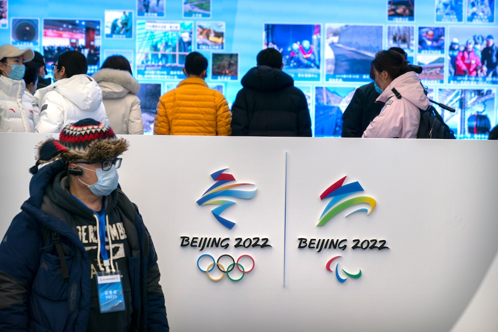 (AP Photo/Mark Schiefelbein)
A journalist wearing a face mask to protect against the spread of the coronavirus looks at an exhibit at a visitors center at the Winter Olympic venues in Yanqing on the outskirts of Beijing, Friday, Feb. 5, 2021. Beijing Olympic organizers showed off the downhill skiing venue and the world's longest bobsled and luge track Friday, one year ahead of the scheduled opening of the 2022 Olympic Winter Games.