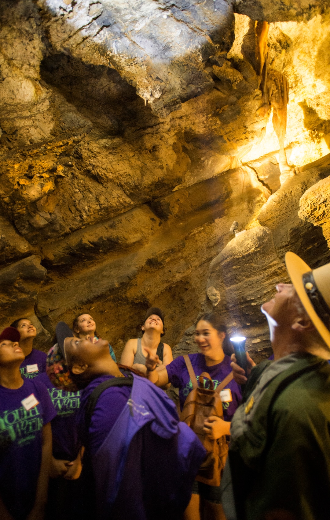 (Rick Egan  |  The Salt Lake Tribune)  Teens from the YouthWorks program wait for a drop of water from a stalactite, as they tour Timpanogos Cave, Thursday, Aug. 3, 2017.
