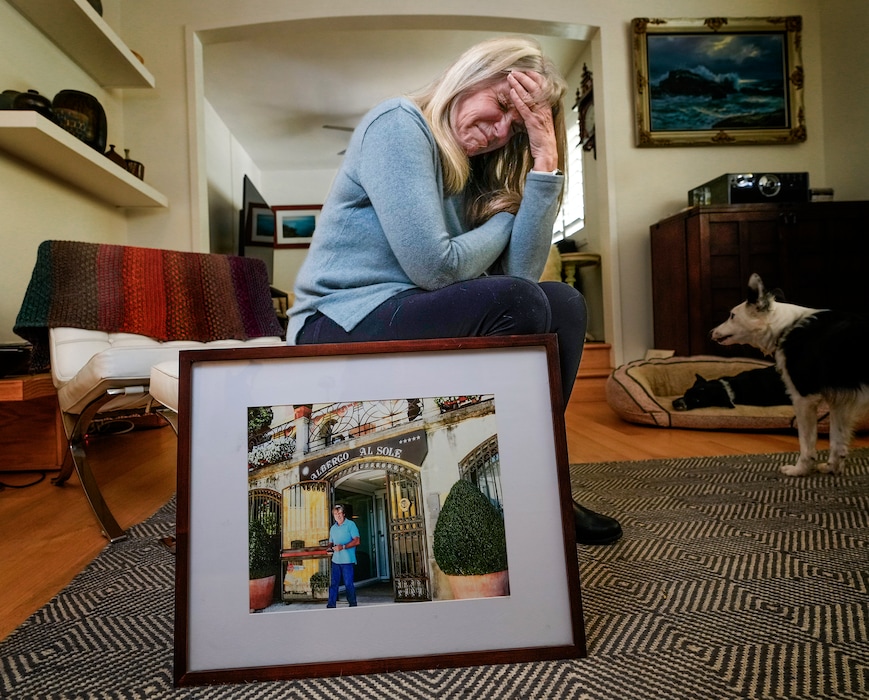 (Leah Hogsten | The Salt Lake Tribune) Becky Crumbo, with her dogs Samwise and Bodhi, Nov. 4, 2021, grimaces as she talks about her husband, Kim Crumbo, pictured in Asolo, Italy, in 2010, during a trip to their beloved vacation destination. Crumbo, 74, and his brother Mark Crumbo O'Neill, 67, were reported overdue from a four-night canoe excursion in Yellowstone National Park on Sept. 19. Search and rescue crews found O'Neill's body Sept. 20, 2021, along the east shore of Shoshone Lake. Kim Crumbo remains missing.