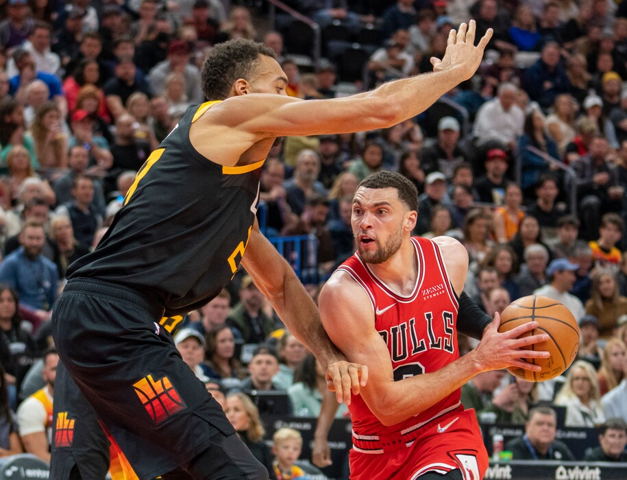 (Rick Egan | The Salt Lake Tribune) Chicago Bulls guard Zach LaVine (8) goes to the hoop as Utah Jazz center Rudy Gobert (27) defends, in NBA action between the Utah Jazz and the Chicago Bulls, at Vivint Arena, on Wednesday, March 16, 2022.