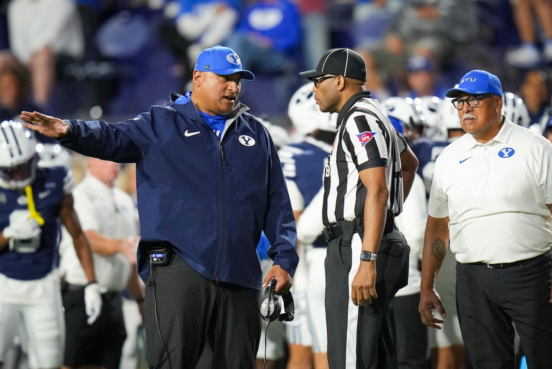 (Bethany Baker  |  The Salt Lake Tribune) BYU Cougars head coach Kalani Sitake speaks with a referee during the game between the BYU Cougars and the Iowa State Cyclones in Provo on Friday, Oct. 9, 2026.