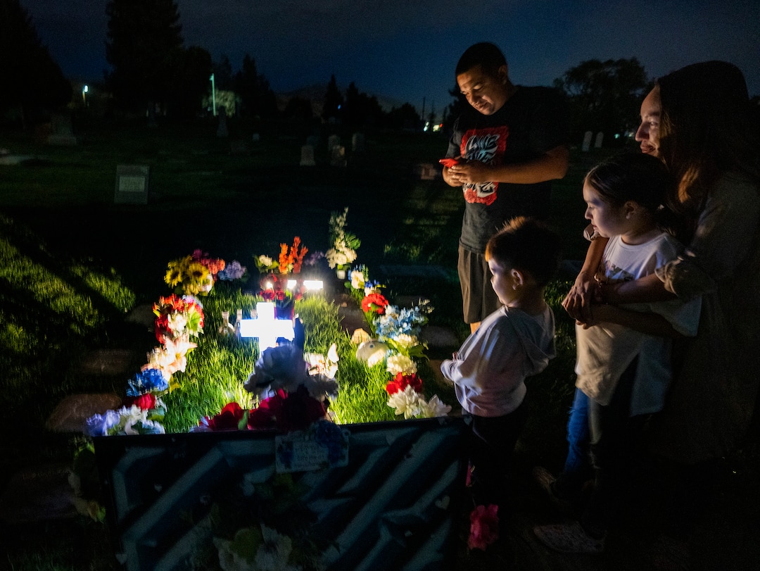 (Rick Egan | The Salt Lake Tribune) Freddie and Karina, the brother and sister of Bernardo Palacios-Carbajal, and his niece and nephew, Analiyah, and Aieden visit Bernard's gravesite at the Salt Lake City Cemetery, on Wednesday, May 19, 2021.