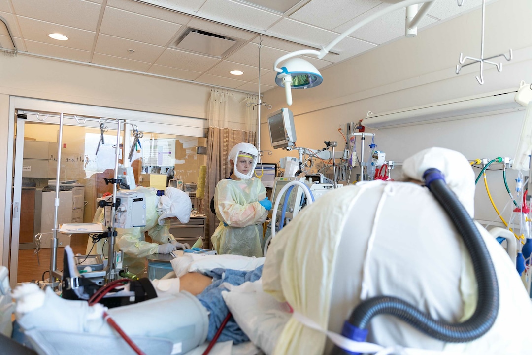 (photo courtesy Intermountain Healthcare) Hospital staff at Intermountain Medical Center in Murray care for patients with COVID-19 on June 9, 2020.