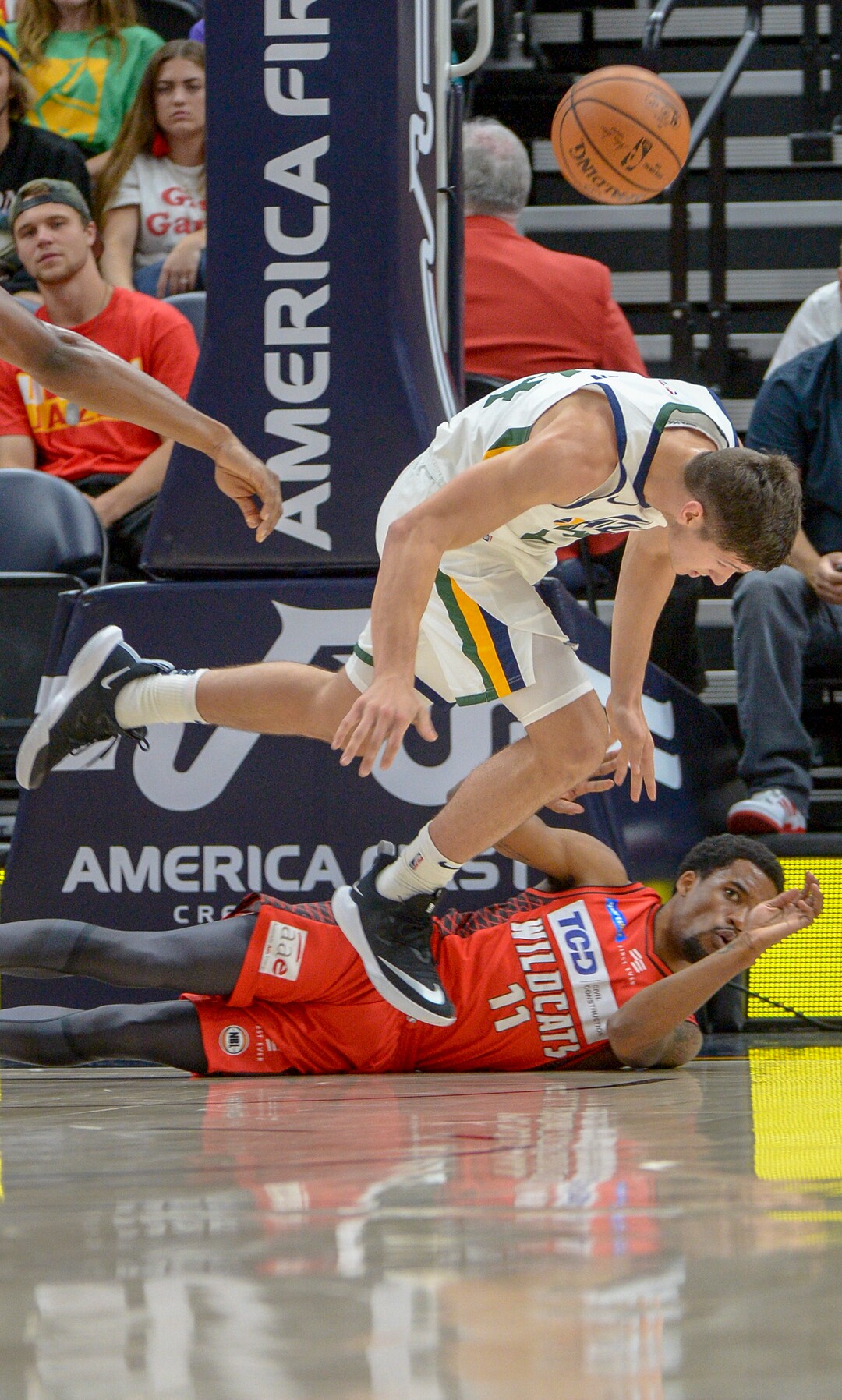 Leah Hogsten  |  The Salt Lake Tribune  Utah Jazz guard Grayson Allen (24) jumps over Perth Wildcats guard Bryce Cotton (11) while trying to rebound as the Utah Jazz host the Perth Wildcats, Sept. 29, 2018 at Vivint Smart Home Arena.