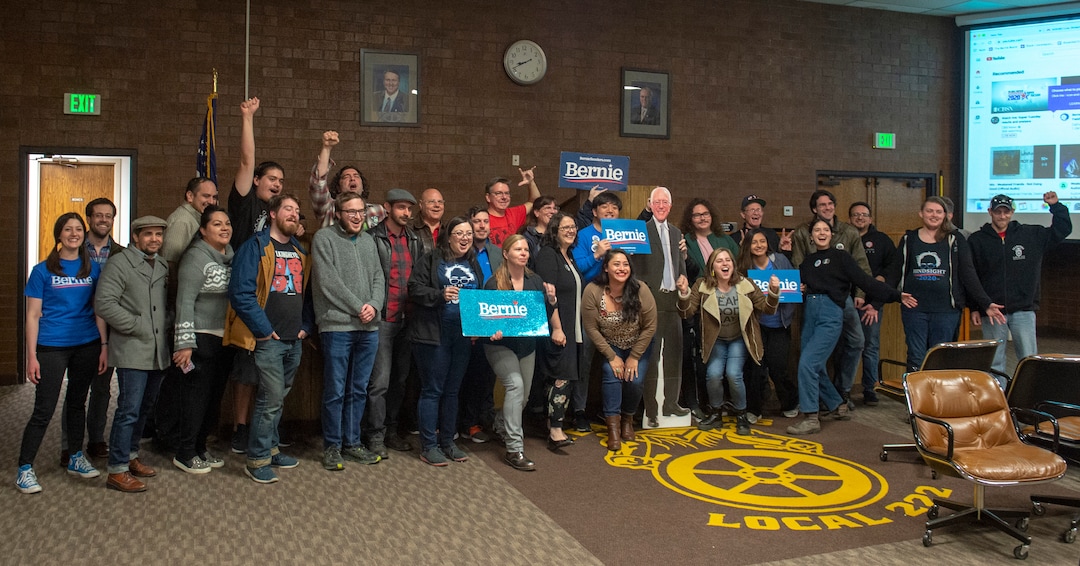 (Rick Egan  |  The Salt Lake Tribune)  Bernie Sanders supporters pose for a photo, during an election watch party at the Teamsters & Chauffeurs Union in West Valley, on Super Tuesday March 3, 2020