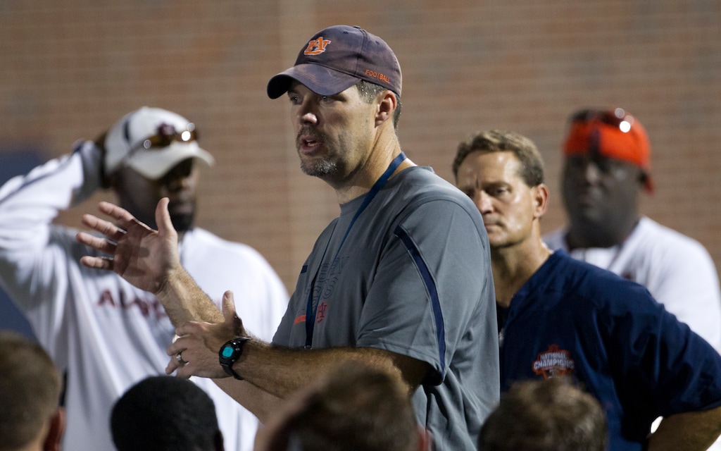 FILE - This Aug. 3, 2011 file photo shows Auburn offensive line coach Jeff Grimes during the first day of fall practice for the Auburn Tigers, in Auburn, Ala. Grimes has a different approach to coaching offensive linemen. (AP Photo/Dave Martin, FIle)