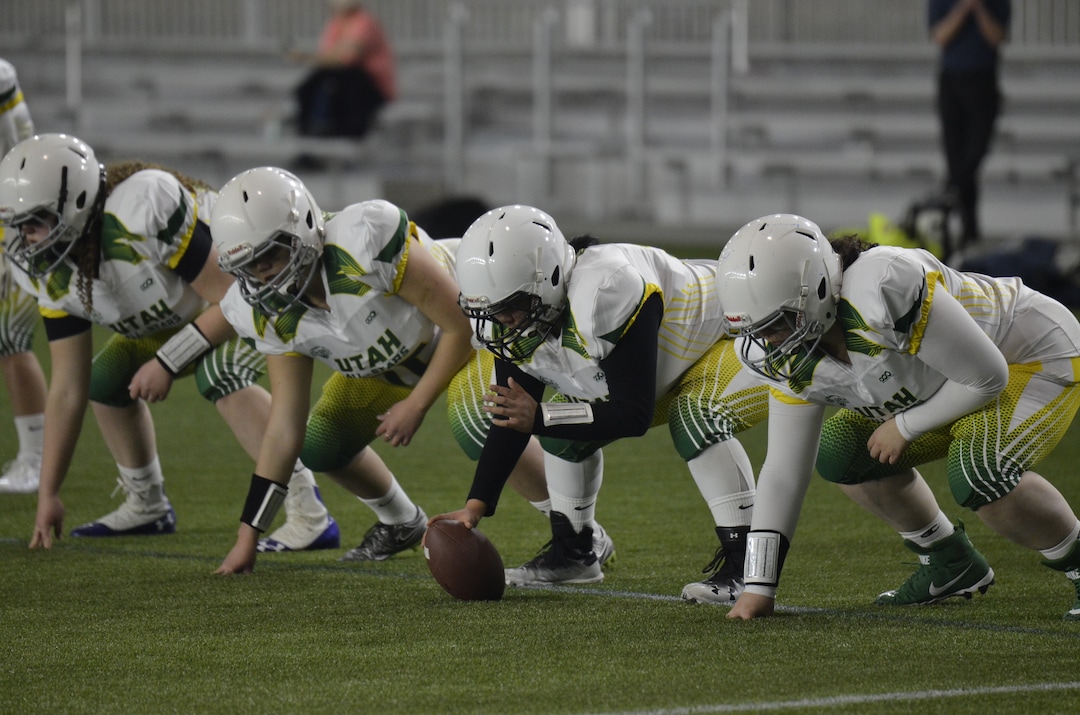 (Alex Vejar | The Salt Lake Tribune) Members of the Utah Girls’ Tackle Football League line up during a practice on Wednesday, Jan. 22, 2020, at the Zions Bank Training Center in Herriman.