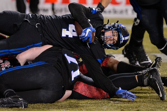 (Trent Nelson | The Salt Lake Tribune) Brigham Young Cougars running back Lopini Katoa (4) stretches out for more yardage as BYU hosts San Diego State, NCAA football in Provo on Saturday, December 12, 2020.