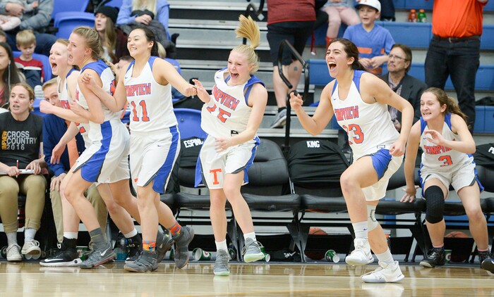 (Leah Hogsten  |  The Salt Lake Tribune) Timpview celebrates the win.  Timpview defeated Skyline 56-49 in their semifinal game of the 5A High School Girls' Basketball Tournament at SLCC in Taylorsville, Friday, Feb. 23, 2018. 