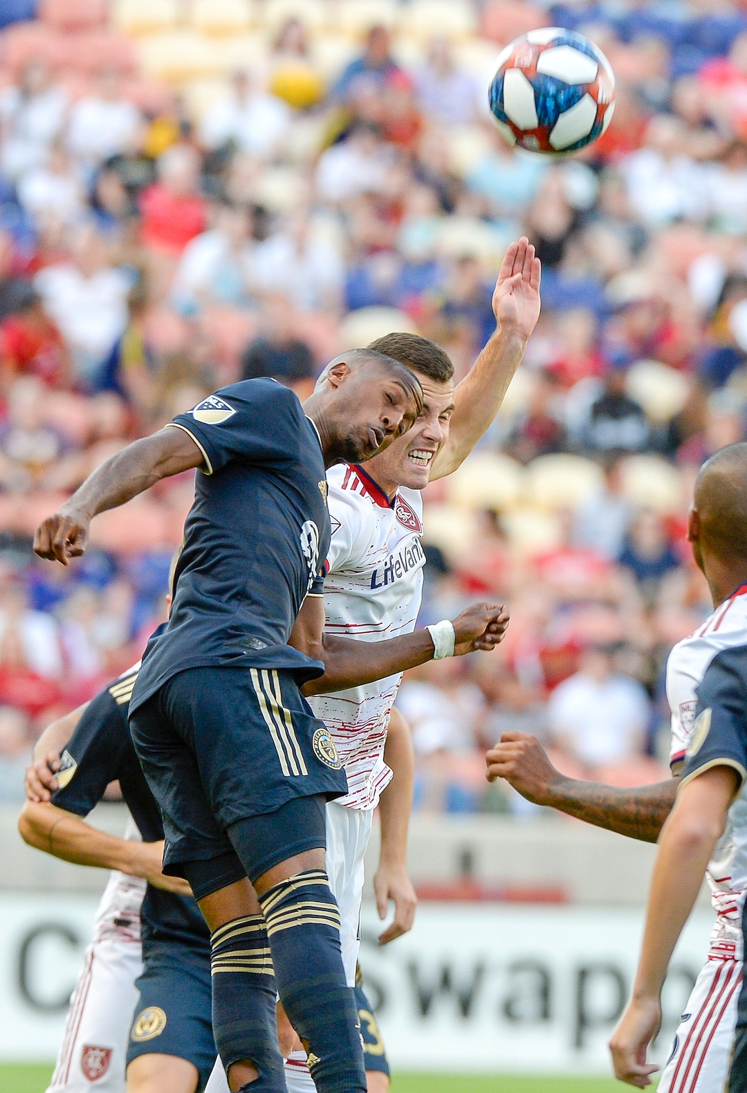 (Leah Hogsten  |  The Salt Lake Tribune) Real Salt Lake forward Brooks Lennon (12) and Philadelphia Union forward Fafa Picault (9) take a header. Real Salt Lake hosts Philadelphia Union in MLS Soccer at Rio Tinto Stadium in Sandy, Utah on Sat, July 13, 2019.