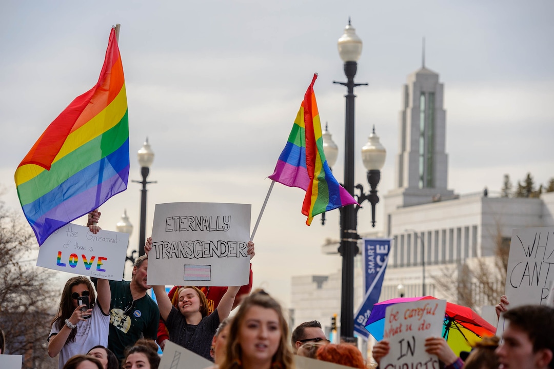 (Trent Nelson  |  The Salt Lake Tribune) Demonstrators at a rally about BYU's changing position on “romantic behavior” by same-sex couples gather in front of the headquarters of The Church of Jesus Christ of Latter-day Saints in Salt Lake City on Friday, March 6, 2020.