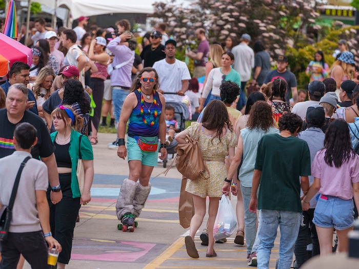 (Leah Hogsten | The Salt Lake Tribune)  Pride festival revelers enjoy the Utah Pride Festival at Washington Square, Saturday, June 4, 2022. 