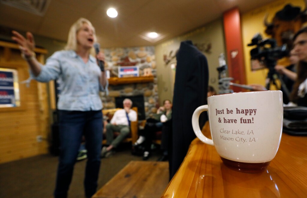 Democratic presidential candidate Sen. Kirsten Gillibrand speaks to local residents at a coffee shop, Saturday, May 25, 2019, in Mason City, Iowa. (AP Photo/Charlie Neibergall)