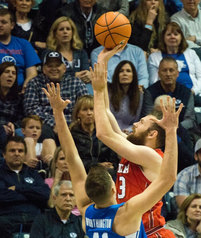(Rick Egan  |  The Salt Lake Tribune)   Utah Utes forward David Collette (13) shoots over Brigham Young Cougars forward Luke Worthington (41), in basketball action Utah Utes vs. Brigham Young Cougars at the Marriott Center in Provo, Saturday, December 15, 2017.


