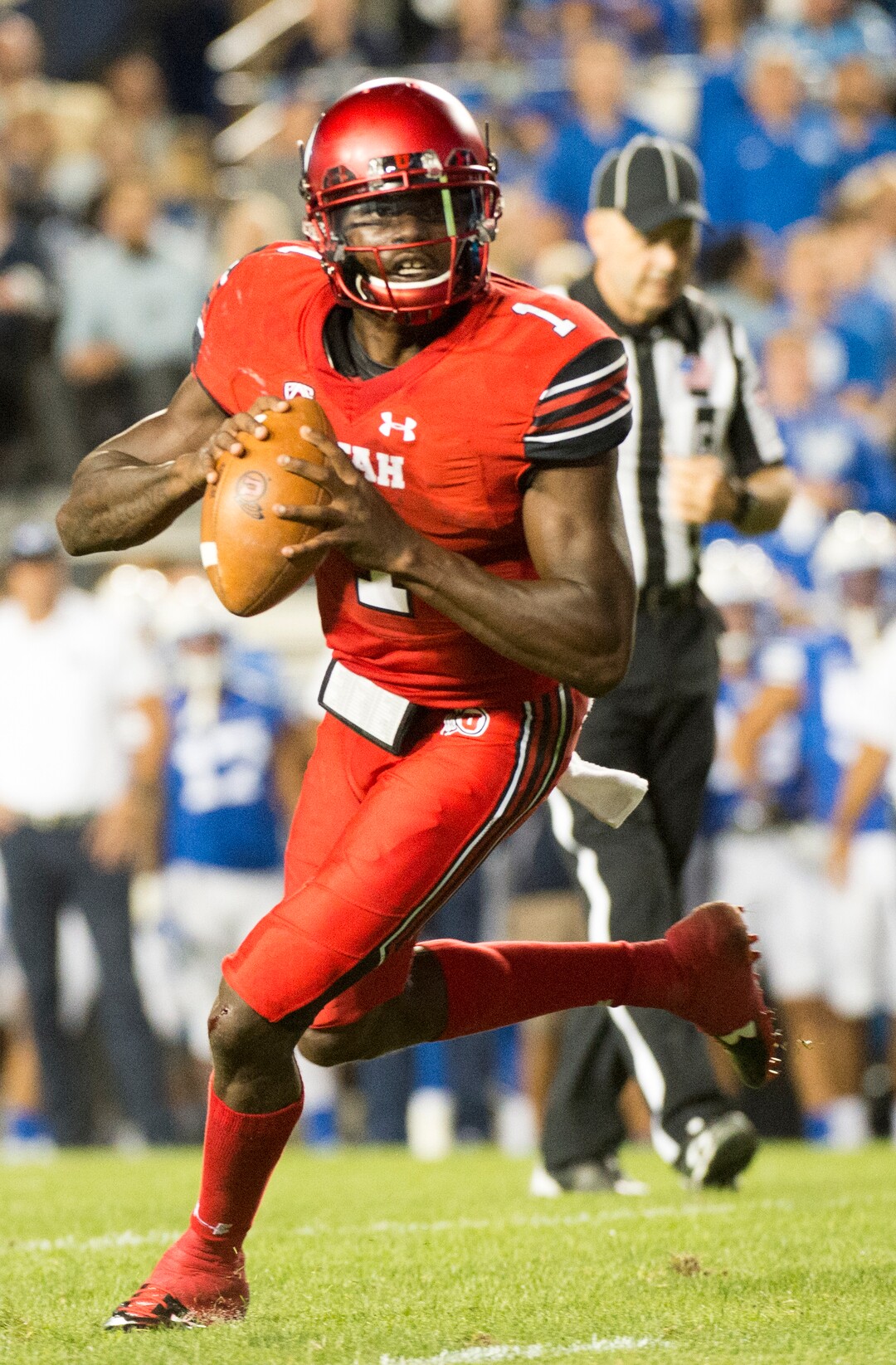 (Rick Egan  |  The Salt Lake Tribune)   Utah Utes quarterback Tyler Huntley (1) looks for  an open man in the end zone, in football action BYU vs Utah, at Lavell Edwards Stadium in Provo, Saturday, September 9, 2017.