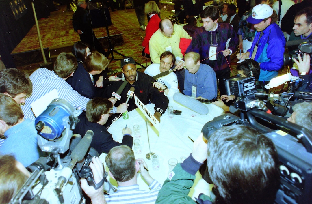 (Rick Egan  | Tribune file photo) Reporters interview the Utah Jazz forward Karl Malone at the Little America hotel during the 1993 All Star Game festivities in Salt Lake City, Saturday, Feb. 20, 1993.