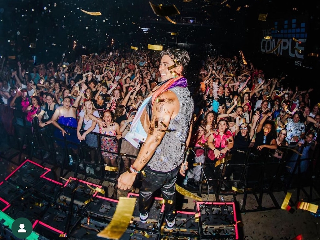 (courtesy Ricky Barrera) Utah DJ Ricky Barrera gets cheers from the crowd at The Complex in Salt Lake City.