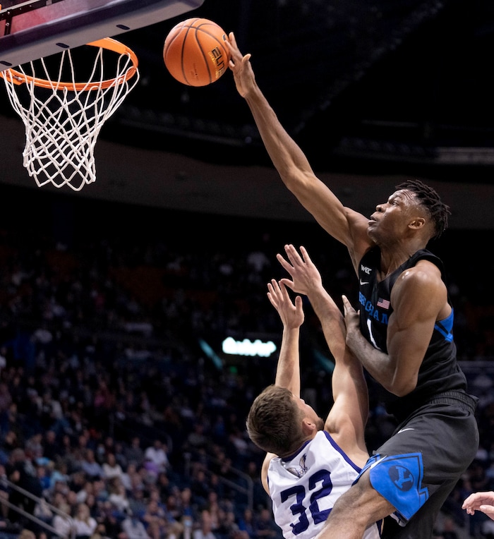 (Francisco Kjolseth | The Salt Lake Tribune) Brigham Young Cougars forward Atiki Ally Atiki (4) comes just shy of the basket over Westminster Griffins guard/forward Dylan Sullivan (32) in basketball action between the Brigham Young Cougars and the Westminster Griffins at the Marriott Center in Provo, Wednesday, Dec. 29, 2021.
