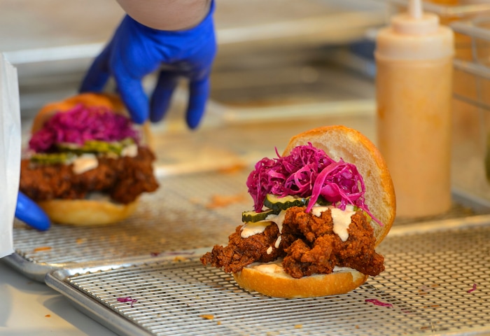 (Steve Griffin  |  The Salt Lake Tribune)  The chicken sandwich at Pretty Bird, a new Nashville-style hot chicken restaurant on Regent Street, in Salt Lake City Monday April 23, 2018.