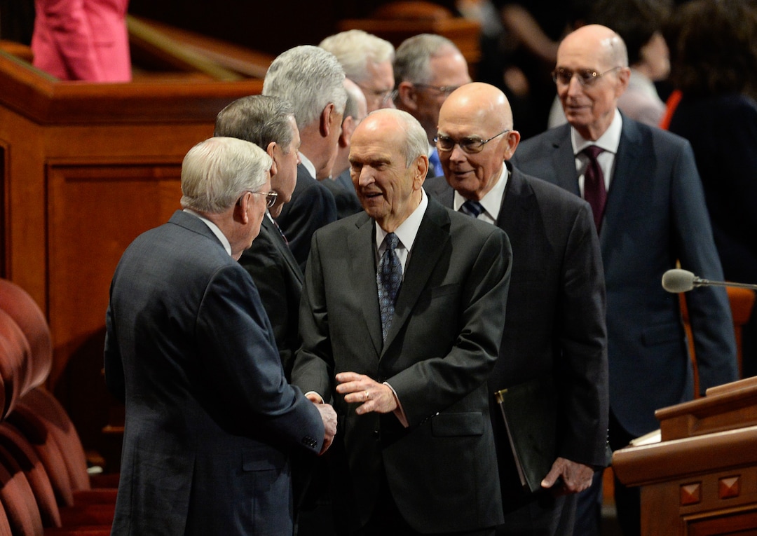 (Francisco Kjolseth  |  The Salt Lake Tribune)  President Russell M. Nelson, center, greets President M. Russell Ballard, acting president of the Quorum of the Twelve Apostles while followed by President Dallin H. Oaks, first counselor in the First Presidency and Henry B. Eyring, second counselor in the First Presidency for the start of the Sunday afternoon session of the 189th twice-annual General Conference of The Church of Jesus Christ of Latter-day Saints at the Conference Center in Salt Lake City on Sunday, Oct. 6, 2019.