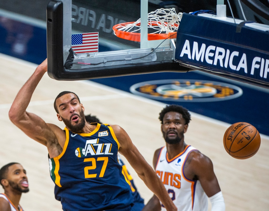 (Rick Egan | The Salt Lake Tribune) Utah Jazz center Rudy Gobert (27) dunks the ball, in NBA action between the Utah Jazz and the Phoenix Suns, on Thursday, Dec. 31, 2020.