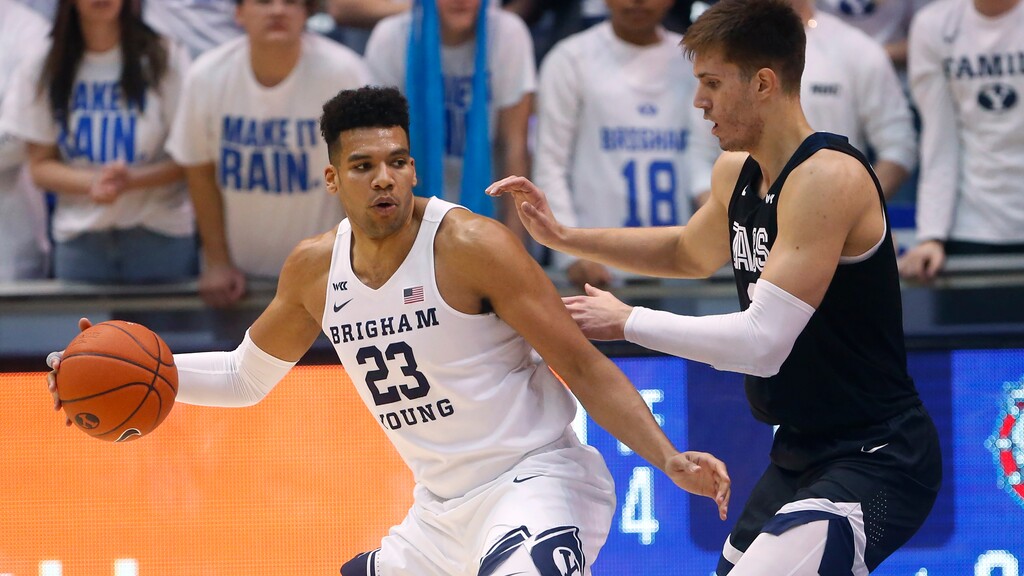 Gonzaga forward Filip Petrusev, right, guards BYU forward Yoeli Childs (23) during the first half of an NCAA college basketball game Saturday, Feb. 22, 2020, in Provo, Utah. (AP Photo/Rick Bowmer)