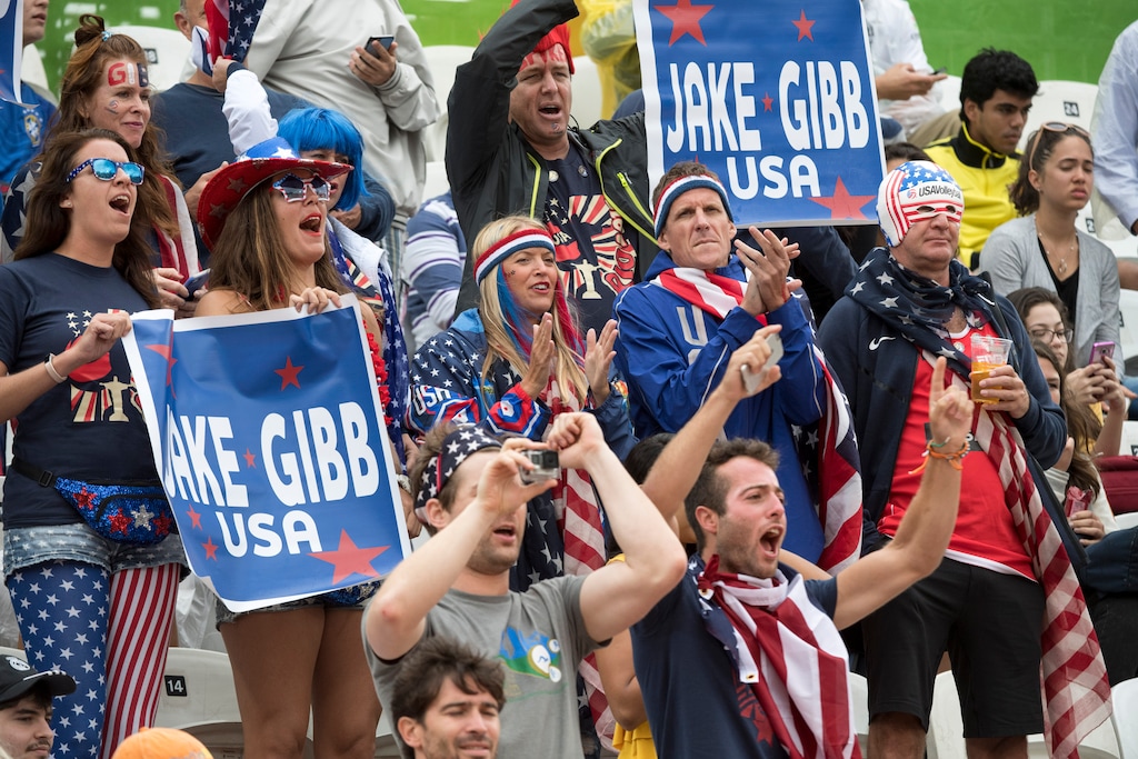 Rick Egan  |  The Salt Lake Tribune

USA fans cheer for Jake Gibb, and Casey Patterson, in beach volleyball action, USA vs. Spain, at the Beach Volleyball Arena, in Rio de Janeiro, Wednesday, August 10, 2016. Gibb will play in the Tokyo Olympics after all, but with new partner Tri Bourne. Gibb's usual partner, Taylor Crabb, tested positive for COVID-19 after arriving in Japan.