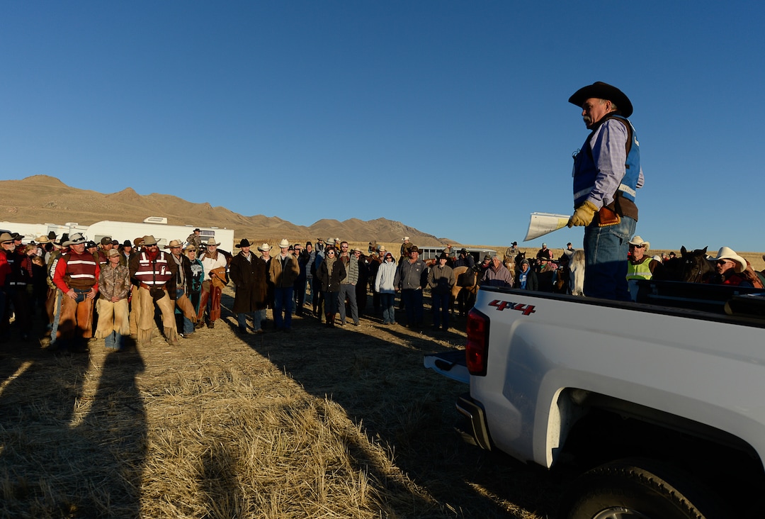 (Francisco Kjolseth  |  The Salt Lake Tribune)  Commander Neil Christensen with Utah County Search and Rescue runs the plan of the day during the cowboy meeting at first light prior to the 33rd annual roundup, Saturday, Oct. 26, 2019, on Antelope Island, a state park located near Syracuse in Davis County. Every year Utah wildlife and parks officials move the animals from across the island so they can be weighed, tagged and given health screenings.